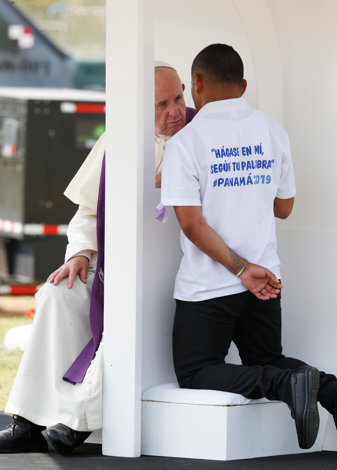 Pope Francis hears confession during a penitential liturgy with juvenile detainees in Las Garzas de Pacora Juvenile Detention Center in Pacora, Panama, Jan. 25, 2019.